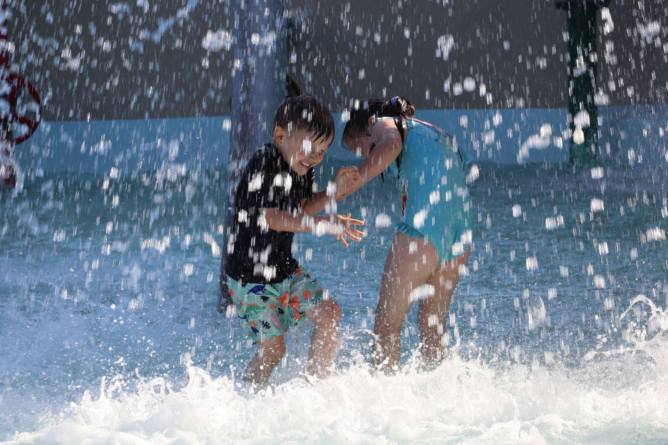 Children playing at the pool